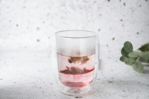 Photo by CRYSTALWEED cannabis clear drinking glass with ice